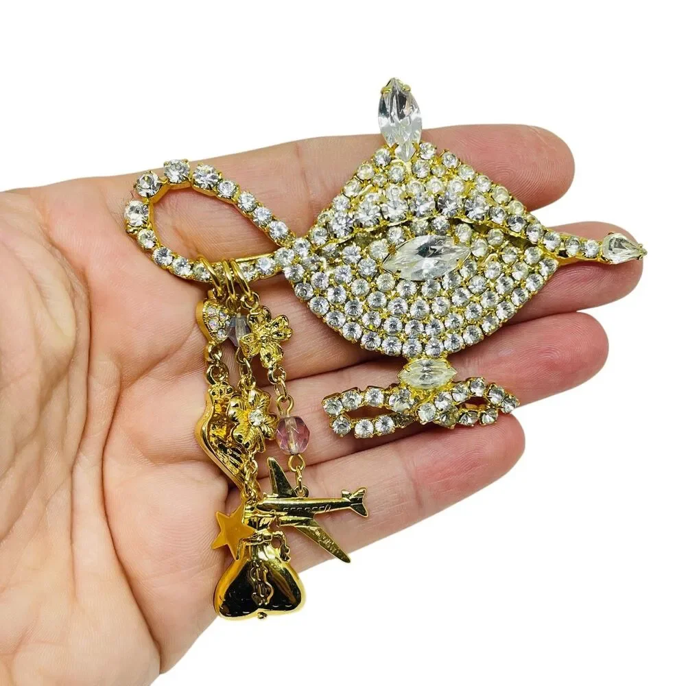 KIRKS FOLLY signed gold tone rhinestone Aladdin lamp designer brooch
